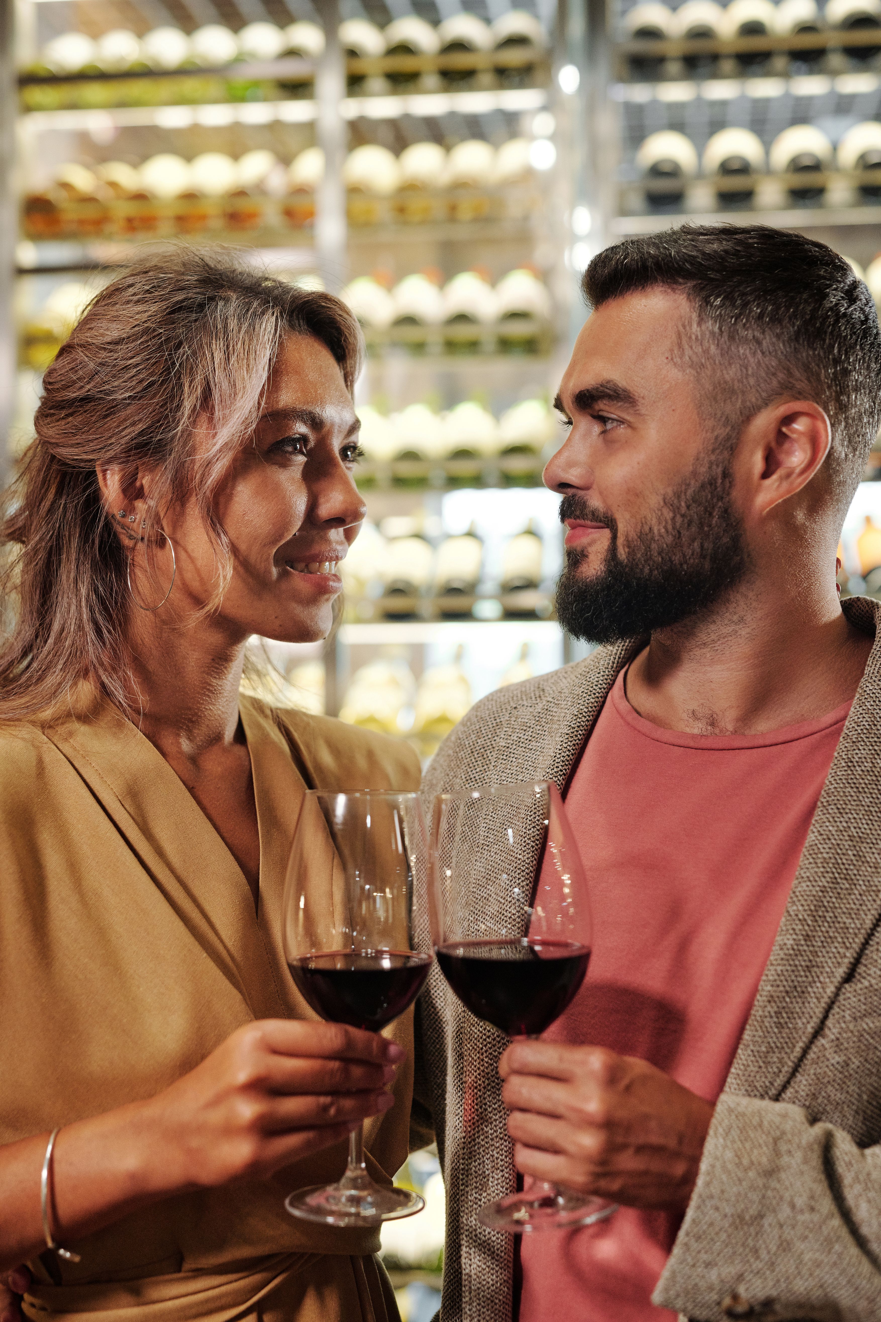 A couple sharing a glass of wine